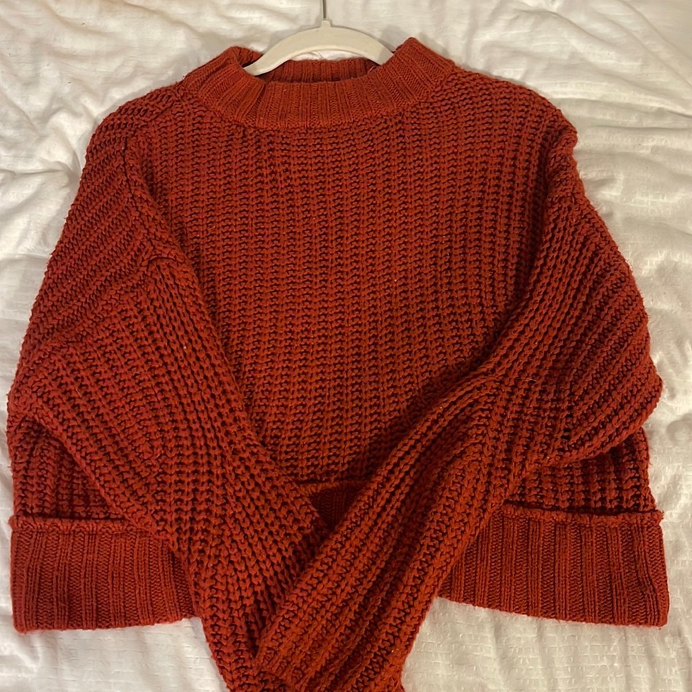 Knitted red/orange sweater